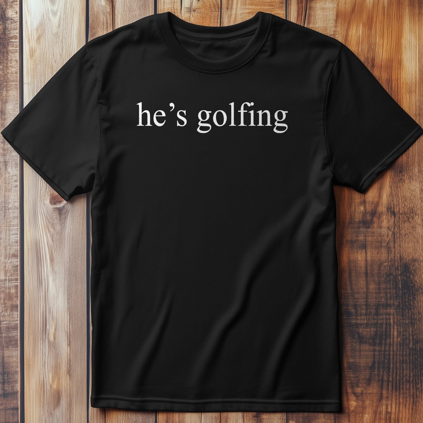 He's Golfing: T-Shirt